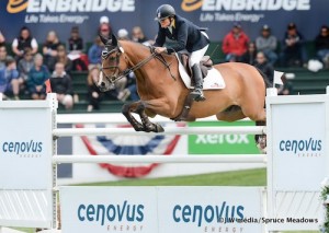 Leslie Howard of USA riding Lennox Lewis 2 during the Census Energy Classic Derby at the Spruce Meadows North American show jumping tournament.
